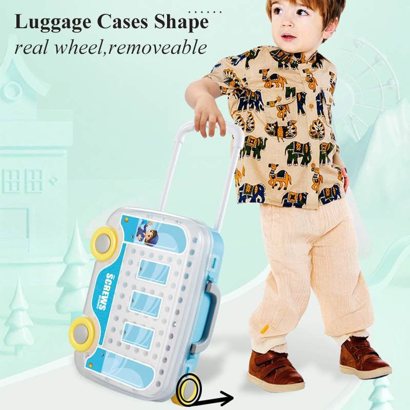 Young boy pulling kids electric drill toy trolley case with real rolling wheels on handle