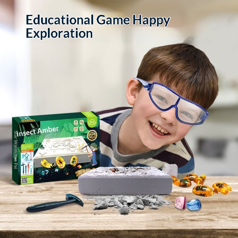 Smiling boy wearing goggles excavating insect amber from plaster block