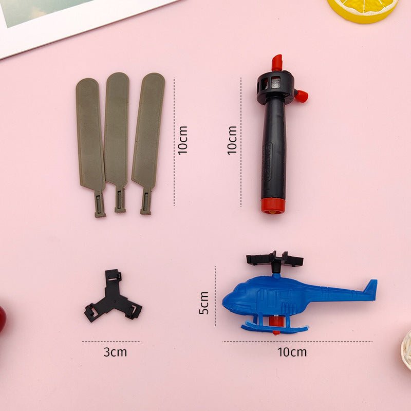 ull-string helicopter toy parts laid flat showing blades launcher connector and blue helicopter body with dimensions