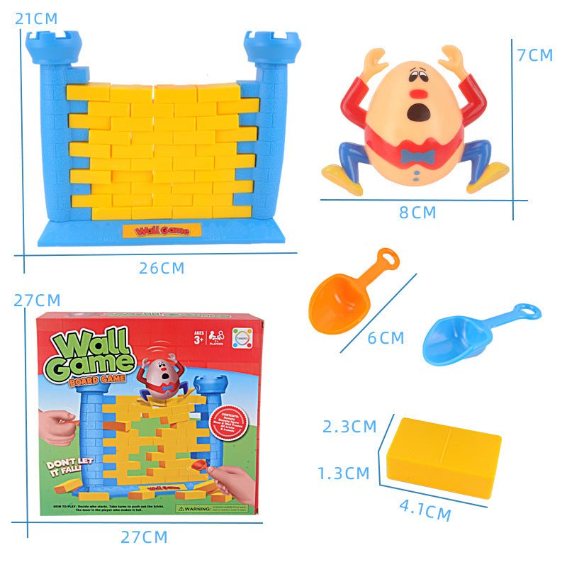 Humpty Dumpty Wall Game dimensions diagram showing 26x21cm wall, 7x8cm figure, 6cm shovels and 4.1x2.3cm bricks