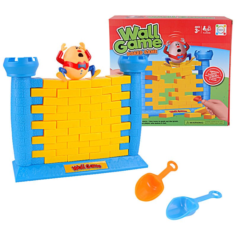 Humpty Dumpty Wall Game set with blue castle frame, yellow bricks, 2 shovels and retail box, ages 3+
