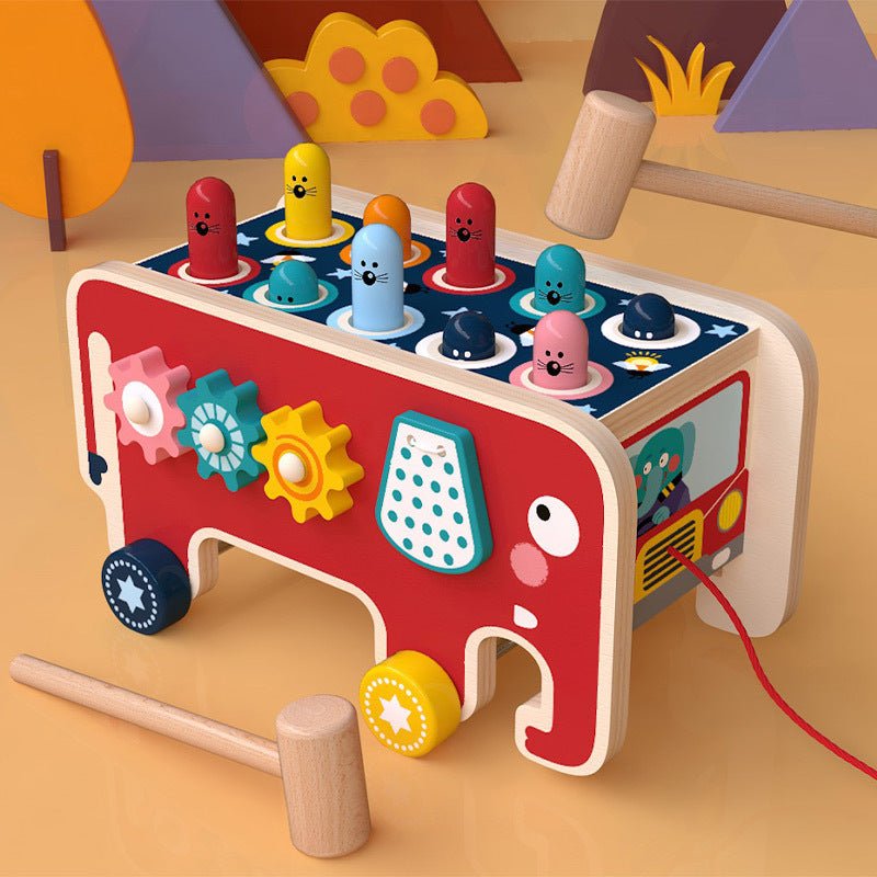 Montessori wooden elephant pounding bench toy with colorful animal pegs, gear spinners and pull-along wheels