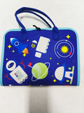 Back of blue space-themed Montessori busy board with handle showing rocket, planet and robot design