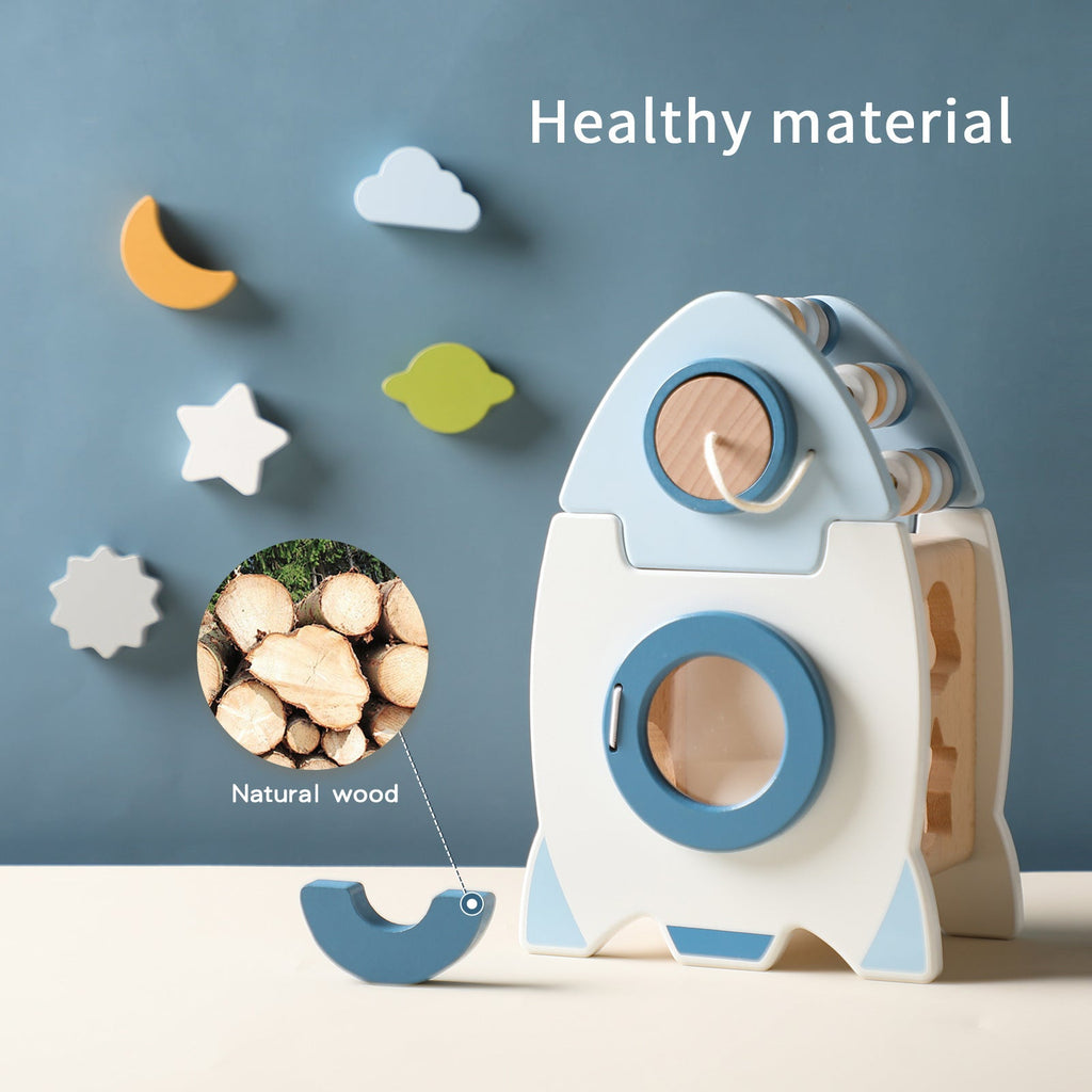 Wooden Rocket Busy Box showing shape recognition and fine motor activities